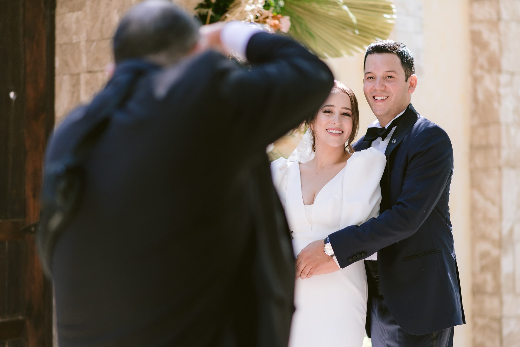 Father of the bride David Lack photographing the couple at his daughter's wedding in Coahuila